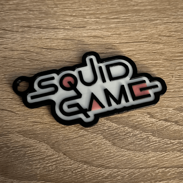 Porte-clés Squid Game fond noir